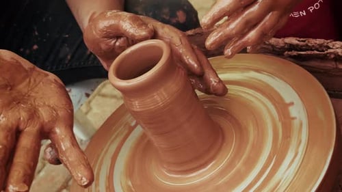 Shaping A Clay Pot In A Ceramics Workshop 44