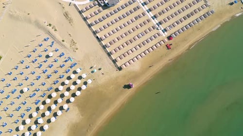 Beach with umbrellas and loungers