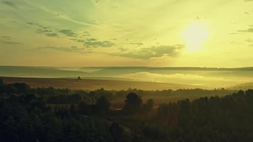 Autumn Fog and the Beautiful Morning Sun in a Landscape Aerial Drone Top View