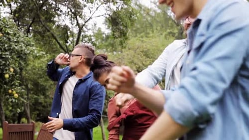 Friends Enjoying a Dance in the Park