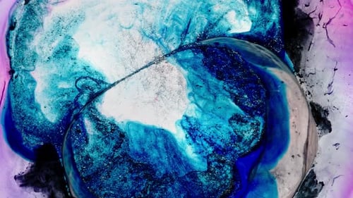 view of swirling blue and white substances mixing in fluid artistic motion
