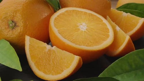 Fresh Oranges with Green Leaves and Dolly Movement