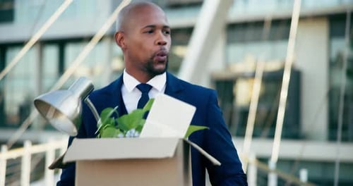 City, happy and business black man with box walking for interview success