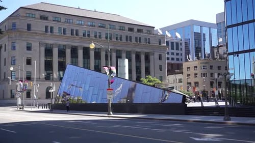 Bank of Canada museum on Wellington Street in Ottawa Canada. Traffic driving by.