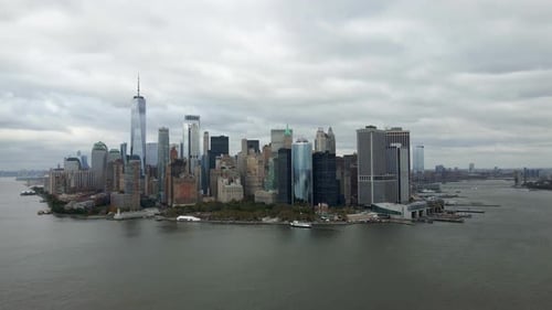 Aerial drone view of the lower Manhattan cityscape, dark, overcast day, in New York, USA