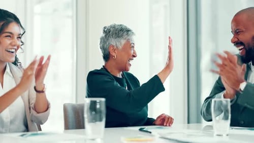 Fist bump, meeting and business people in office with applause for winning, promotion or success