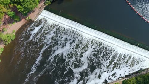 Aerial view of a weir and river, United Kingdom.