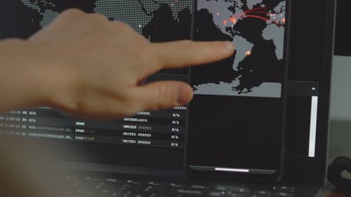 Cybersecurity Data on Laptop and Mobile Phone