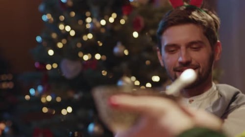 Friends Gather for Christmas Dinner Celebration