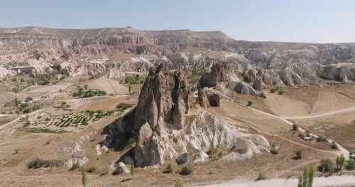 Aerial view of a large, rugged rock formation in the desert, Cappadocia, Turkey