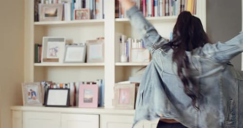 Dancing, home and happy woman with groove, vibe or energy for fun holiday, weekend or music