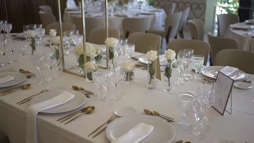 Elegant Wedding Table Setting with White Roses