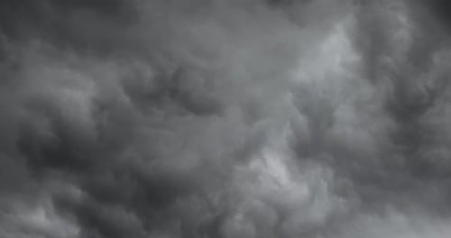 Dark storm clouds cover the sky