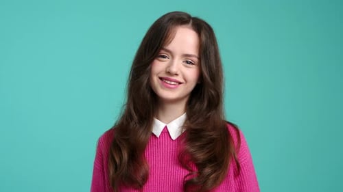 Closeup View of a Teenager Smiling While Looking at Camera