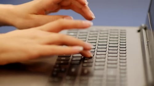 Closeup of Business Woman Hand Typing on Laptop Keyboard Closeup of a Female Hands Busy Typing on a