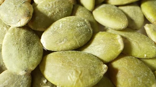 Vibrant and nutritious, green pumpkin kernels are nature's gems.