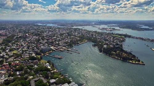 Drone Shot Of Waterway Aerial Photograph Capturing Tranquil Coastal Bay With Ships And Lush Trees
