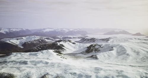 Stunning View of Snow Covered Mountains in a Remote Landscape During Winter
