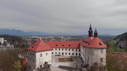 Drone shot of a castle and museum Skofja Loka, Slovenia. A historic medieval castle in Slovenia, a p