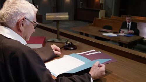 Senior Judge Bangs Gavel in Courthouse