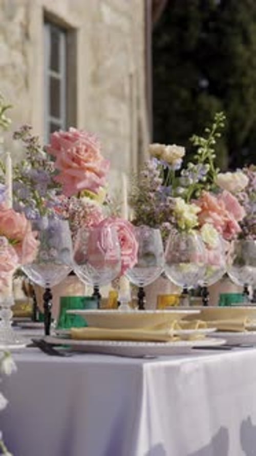 Elegant Wedding Table Setting with Floral Decorations