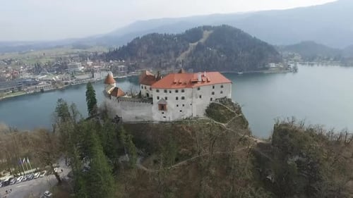 Point view of aerial footage Bled Castle of the with Lake Bled in the background. Slovenia