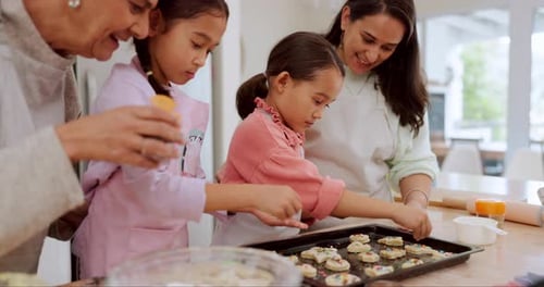 Family Baking Cookies Together in Home Kitchen