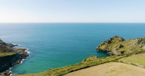 Looking Out To Sea Over Stunning Coastal Cliffs Aerial Drone Shot