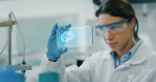 Portrait of futuristic researcher using the augmented reality screen with hologram graphics for vi