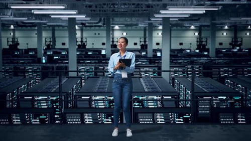 Full Body Of Asian Business Woman Using Tablet An Looking Around In Data Center