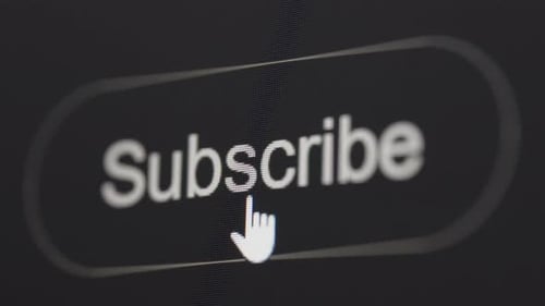 Clicking subscribe button on black background