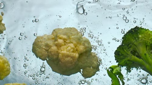 Slices Cabbage Dropped Water on White Background Close Up