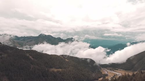 Mountain Panorama With Valley Fog And Clouds