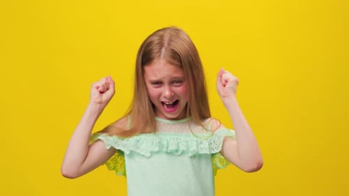 Child Anger Portrait of Furious Little Girl Kid Screaming Looking at Camera