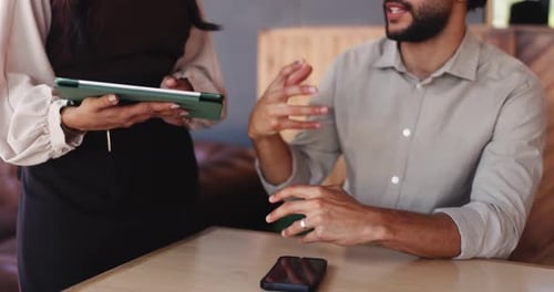 Cafe, hands and waitress with tablet for choice, online menu and suggestion