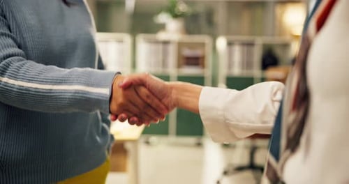 Business people, handshake and night with agreement in meeting for hiring or recruiting at office