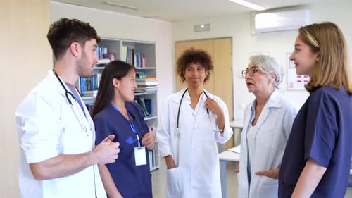 Medical Team Engaging in Collaborative Discussion in Hospital