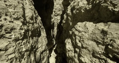 Rocky Canyon Path Through Narrow Crevices in Desert Terrain