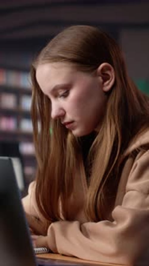 Vertical Video University Student Does Research on Foreign Affairs Via Primary Source Materials