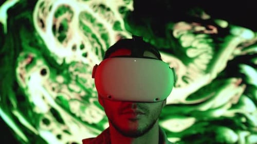 Young Adult Immersed in Virtual Reality Headset