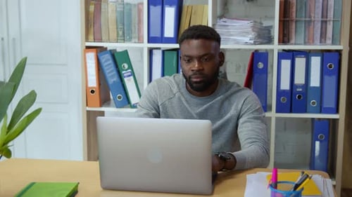 LONDON UNITED KINGDOM 20 OCTOBER 2019 Young Entrepreneur of African Ethnicity Using Laptop Computer