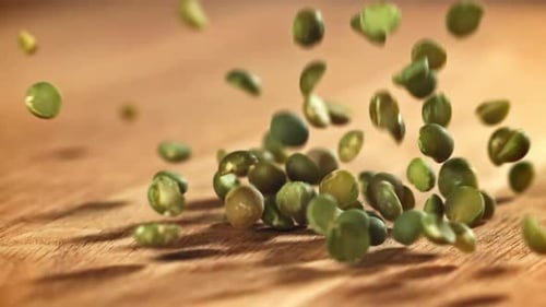 Green Peas Fall on the Table Filmed on a Highspeed Camera at 1000 Fps