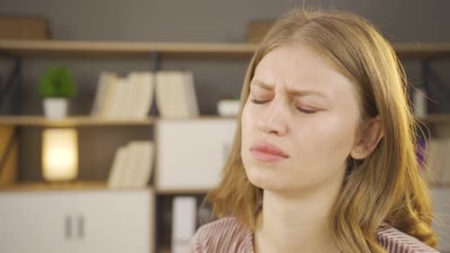 Close-up face of unhappy woman.