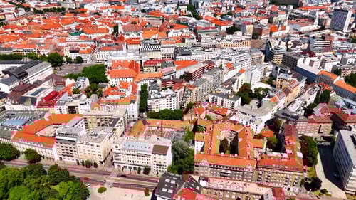 Old multi-storied buildings with orange roof in the scenery of the old town.