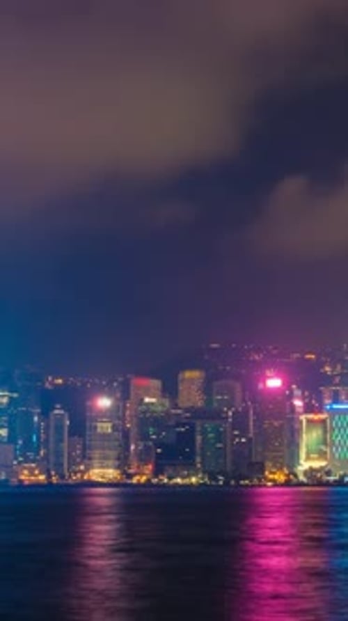 Night Imelapse of Illuminated Hong Kong Skyline Hong Kong China