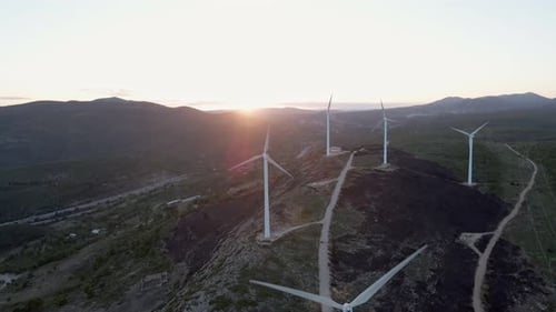 Wind turbines producing renewable electrical energy in Valencia, Spain, aerial view