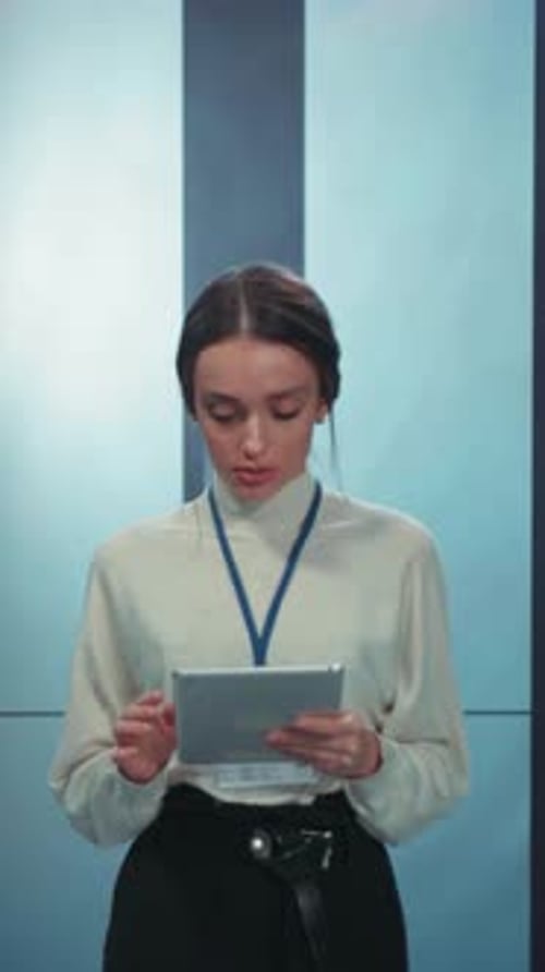 A Dedicated Professional Actively Using a Tablet in a Modern and Efficient Workspace Environment