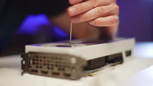Detail Cropped Shot of Unrecognizable Repairman Working in Workshop or Hardware Computer Service