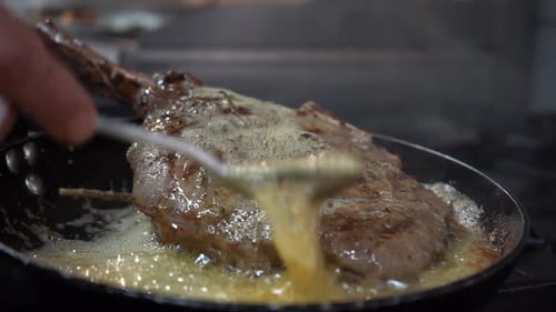 Tender Steak Basted with Butter in Pan