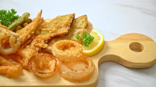 Crispy Fried Food Platter with Onion Rings and Vegetables
